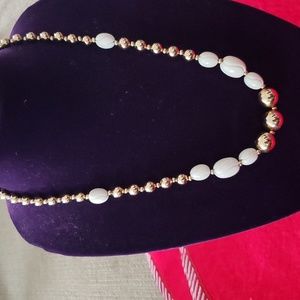 Gold, cream necklace